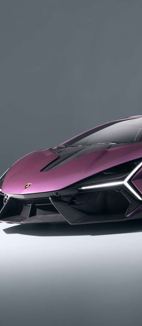 A highly detailed, cinematic shot of the 2026 Lamborghini Revuelto featuring its... Xiaomi Redmi 14C 5G free background