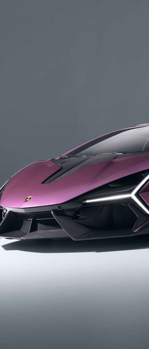A highly detailed, cinematic shot of the 2026 Lamborghini Revuelto featuring its... nubia Flip 3 wallpaper download