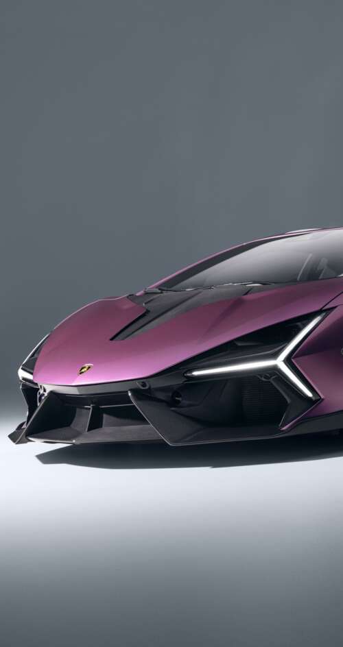 A highly detailed, cinematic shot of the 2026 Lamborghini Revuelto featuring its... Sharp Aquos C10 download free phone wallpaper