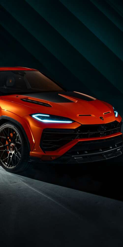 The 2026 Lamborghini Urus SE parked in a dark, cinematic urban environment with dramatic... Ulefone Rugking 2 Pro wallpaper download