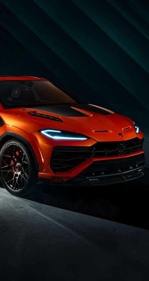 The 2026 Lamborghini Urus SE parked in a dark, cinematic urban environment with dramatic... Sharp Aquos C10 high definition wallpaper