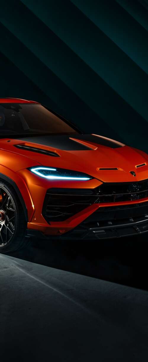 The 2026 Lamborghini Urus SE parked in a dark, cinematic urban environment with dramatic... Samsung Galaxy Z Flip7 FE free background