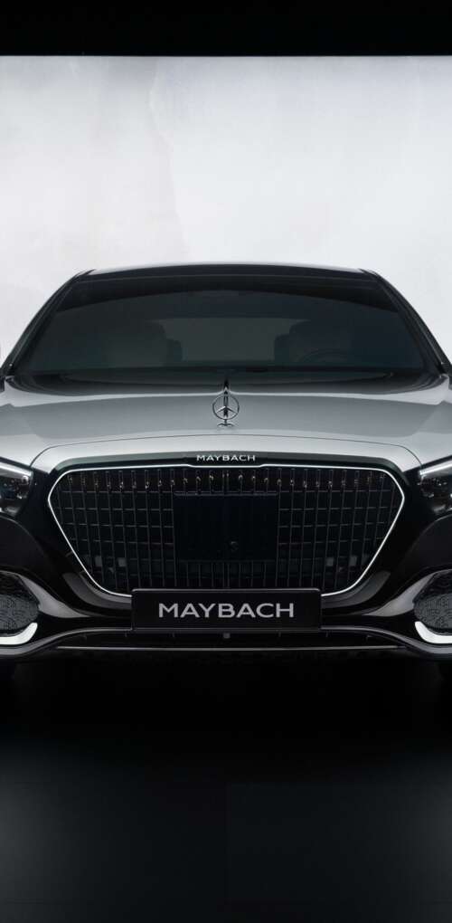 A high-detail, cinematic view of the 2026 Mercedes-Maybach S 580 luxury sedan showcasing... Huawei Mate 30 Pro free background