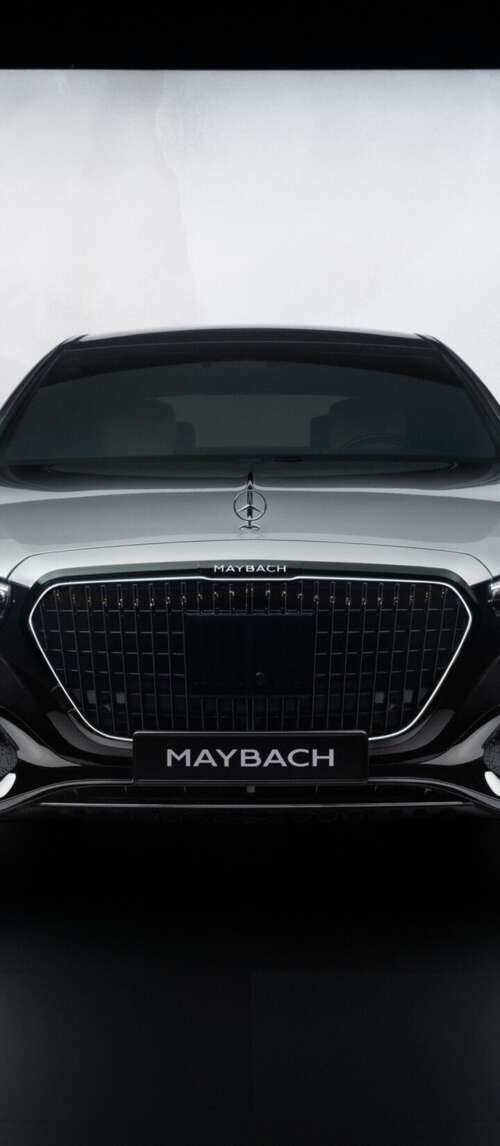 A high-detail, cinematic view of the 2026 Mercedes-Maybach S 580 luxury sedan showcasing... Xiaomi Redmi 14C 5G download free wallpaper for phone