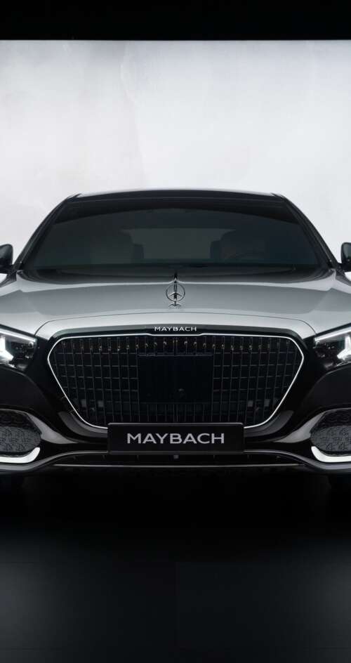 A high-detail, cinematic view of the 2026 Mercedes-Maybach S 580 luxury sedan showcasing... Sharp Aquos C10 free background