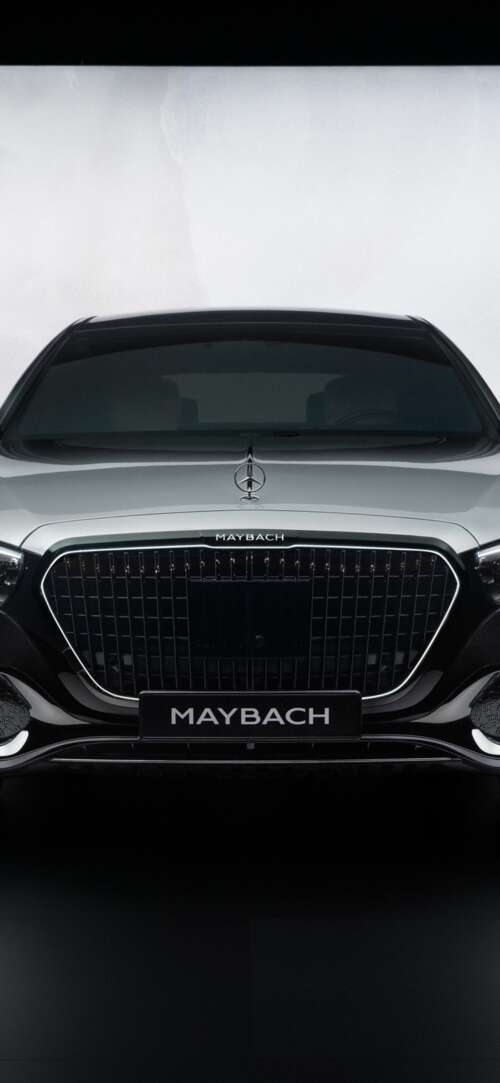 A high-detail, cinematic view of the 2026 Mercedes-Maybach S 580 luxury sedan showcasing... Xiaomi Redmi 15 4G wallpaper download