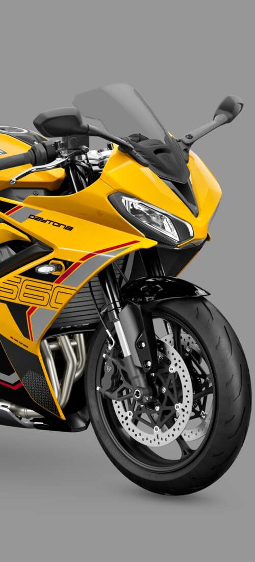 A high-detail, professional shot of the 2026 Triumph Daytona 660 sports motorcycle... Honor X70 cell phone backgrounds free