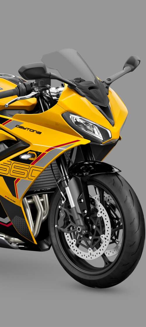 A high-detail, professional shot of the 2026 Triumph Daytona 660 sports motorcycle... Motorola Moto G56 5G cell phone backgrounds free