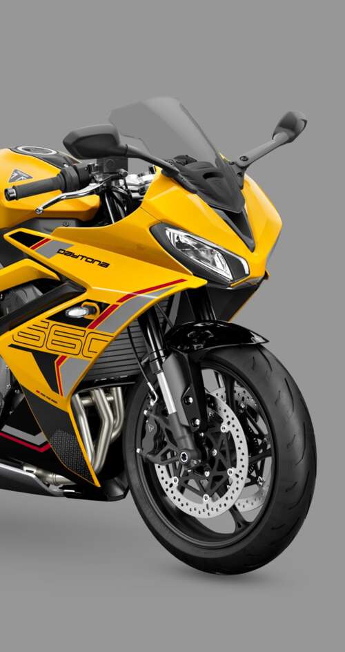 A high-detail, professional shot of the 2026 Triumph Daytona 660 sports motorcycle... Sharp Aquos C10 download free wallpaper for phone