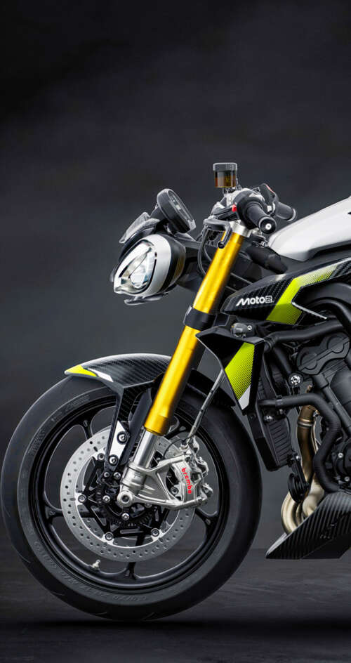 A high-performance 2026 Triumph Street Triple 765 Moto2 Edition motorcycle set against... Sharp Aquos C10 free background images