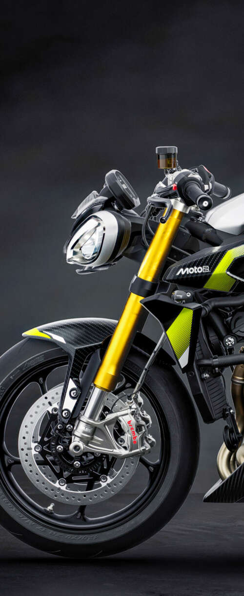 A high-performance 2026 Triumph Street Triple 765 Moto2 Edition motorcycle set against... Samsung Galaxy Z Flip7 FE download free phone wallpaper