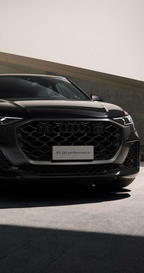 A sleek black Audi RS Q8 luxury performance SUV presented in a high-quality, cinematic... Sharp Aquos C10 free wallpaper