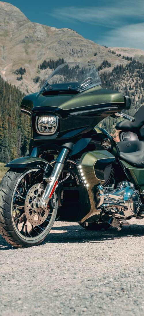 A high-resolution, detailed close-up of a 2026 Harley-Davidson Street Glide motorcycle... cell phone backgrounds free