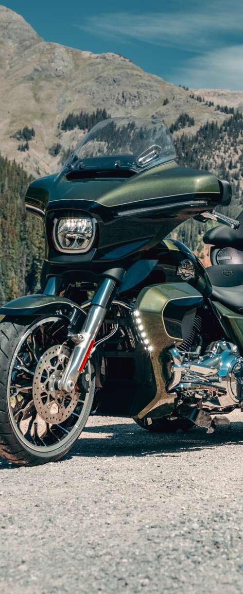 A high-resolution, detailed close-up of a 2026 Harley-Davidson Street Glide motorcycle... Samsung Galaxy Z Flip7 FE download free wallpaper for phone