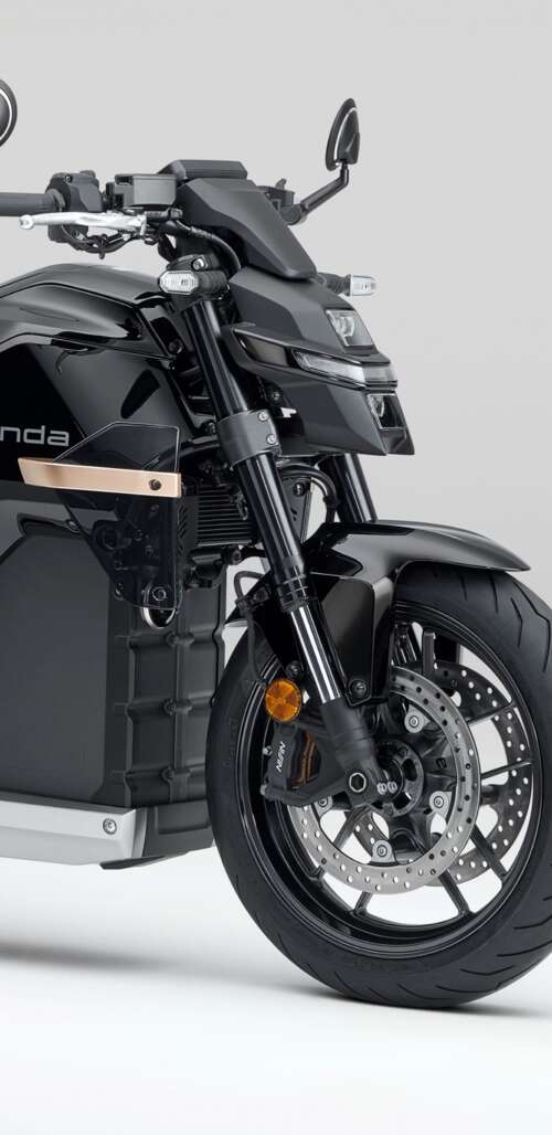 Close-up shot of the Honda WN7 electric motorcycle showcased at the EICMA Motorcycle... wallpaper photo gallery download