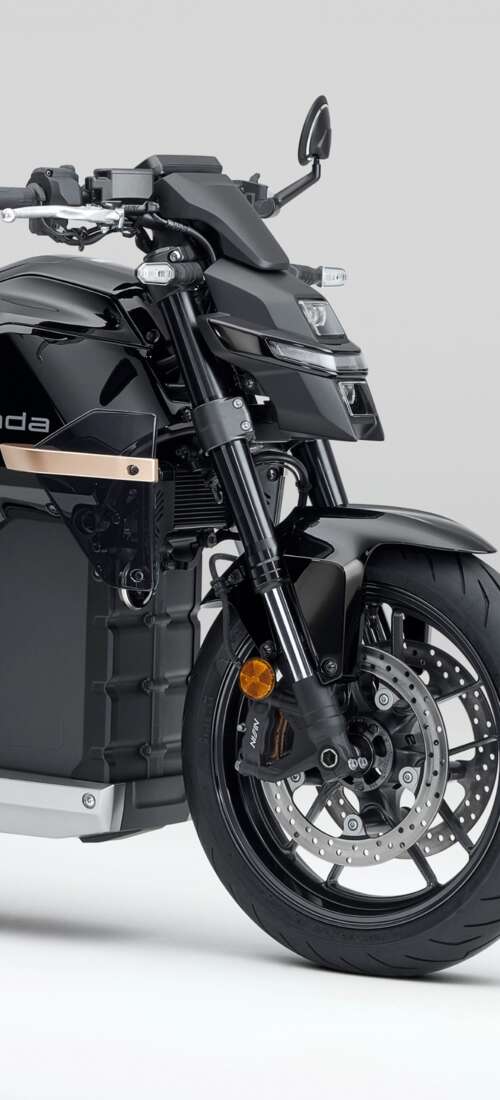 Close-up shot of the Honda WN7 electric motorcycle showcased at the EICMA Motorcycle... Oppo Find X9 free wallpaper