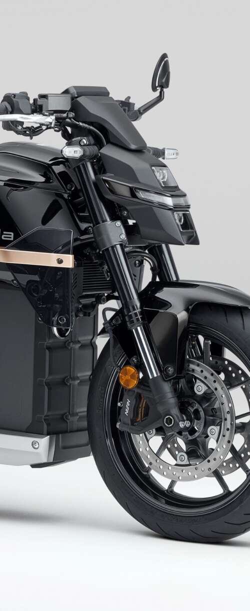 Close-up shot of the Honda WN7 electric motorcycle showcased at the EICMA Motorcycle... Samsung Galaxy Z Flip7 FE free background images