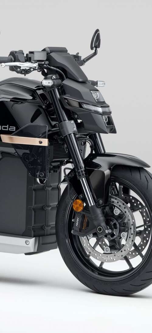 Close-up shot of the Honda WN7 electric motorcycle showcased at the EICMA Motorcycle... realme GT 7T free hd wallpapers
