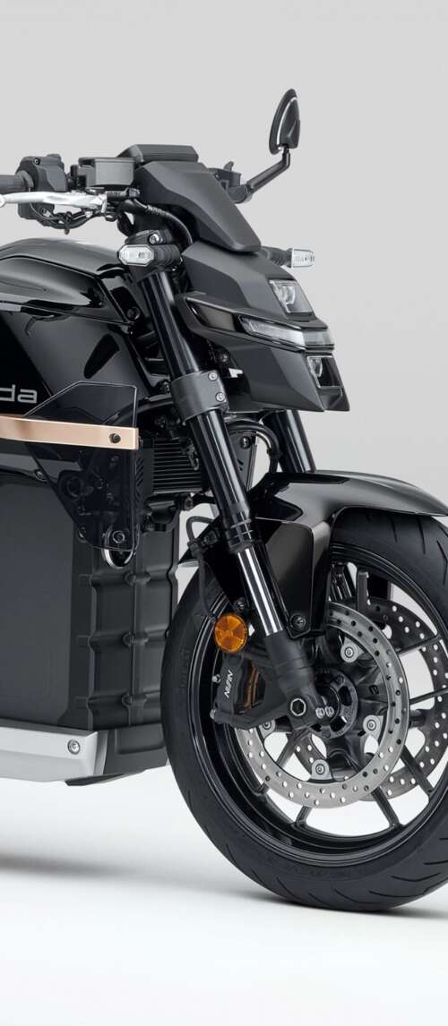 Close-up shot of the Honda WN7 electric motorcycle showcased at the EICMA Motorcycle... Xiaomi Redmi 14C 5G free hd wallpapers