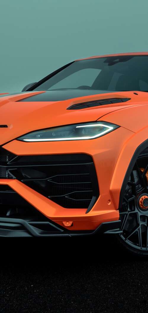 A high-resolution photograph of a Lamborghini Urus SE parked on a city street with... Oppo A6k 4G download free phone wallpaper