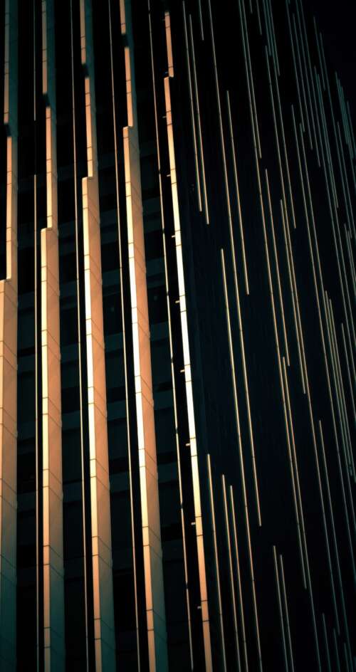 A dark, modern glass building in Abu Dhabi showcasing contemporary architectural... Sharp Aquos C10 background images hd