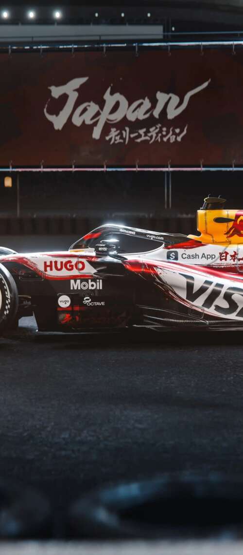 The VCARB 03 Formula One car racing through the tracks of the Suzuka circuit during... Blackview XPLORE 1 Pro download free phone wallpaper