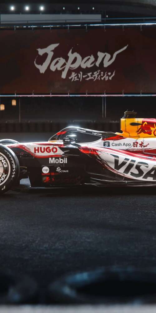 The VCARB 03 Formula One car racing through the tracks of the Suzuka circuit during... Ulefone Rugking 2 Pro wallpaper photo gallery download