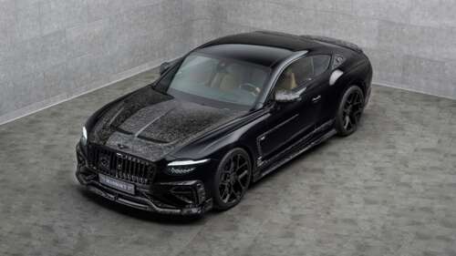 A sleek, black 2025 Mansory Bentley Continental GT Speed with custom widebody aerodynamic... wallpaper