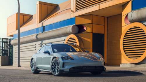 A premium studio shot of the 2025 Porsche Taycan 4S Cross Turismo highlighting its... wallpaper
