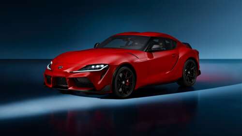 A detailed shot of a sleek, red 2025 Toyota GR Supra sports car. free wallpaper