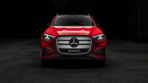 A red 2026 Mercedes-Benz GLC 400 electric crossover against a dark, cinematic background. wallpaper download