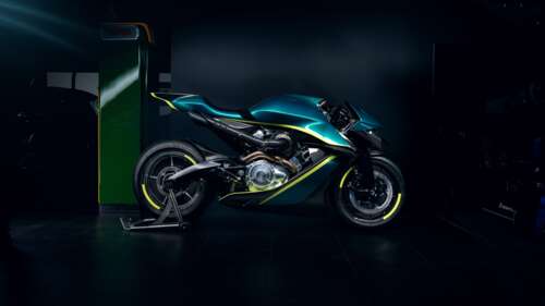 Close-up of the Aston Martin AMB 001 Pro superbike in a dark, cinematic setting. wallpaper