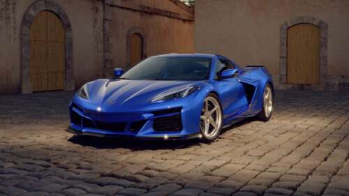 A high-performance Chevrolet Corvette E-Ray hybrid sports car featuring advanced... wallpaper