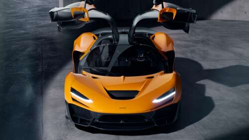 A highly detailed view of the 2024 McLaren W1 supercar featuring sleek aerodynamic... free wallpaper