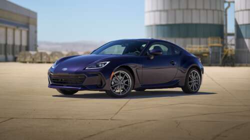 A high-resolution close-up of a 2025 purple Subaru BRZ sports car. wallpaper