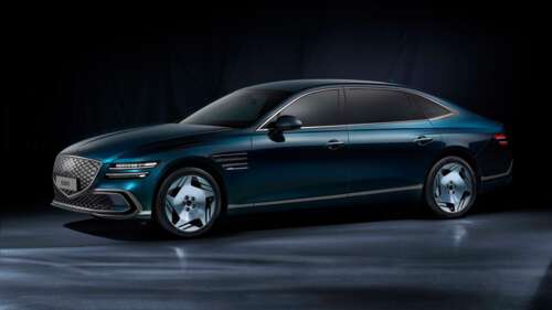 A high-detail, cinematic shot of the Genesis Electrified G80 luxury electric sedan... free wallpaper