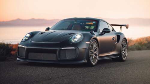 A detailed view of a Porsche 911 GT2 RS featuring the Weissach package, highlighting... free wallpaper