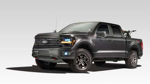A high-resolution studio shot of a 2024 Ford F-150 pickup truck isolated on a white... wallpaper