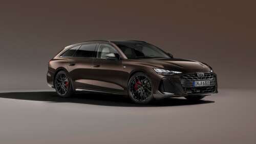 A high-resolution studio shot of the 2025 Audi A6 Avant station wagon against a solid... wallpaper