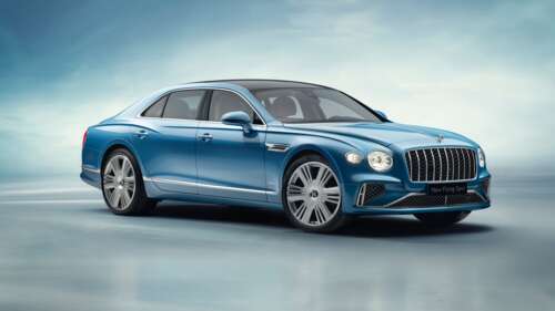 A high-definition, close-up shot of the 2025 Bentley Flying Spur Azure luxury sedan. wallpaper