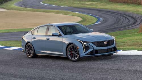 A high-resolution, detailed shot of the 2025 Cadillac CT5-V Blackwing luxury sports... wallpaper