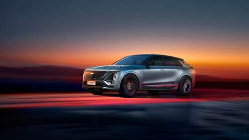 A high-resolution professional shot of the 2025 Cadillac Lyriq-V electric luxury... wallpaper