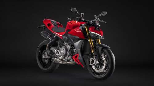 A highly detailed 2025 Ducati Streetfighter V2 motorcycle set against a dark, atmospheric... free wallpaper