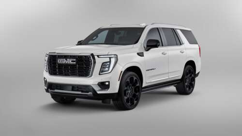 2025 GMC Yukon Denali 25th Anniversary Edition luxury SUV isolated on a white background free wallpaper