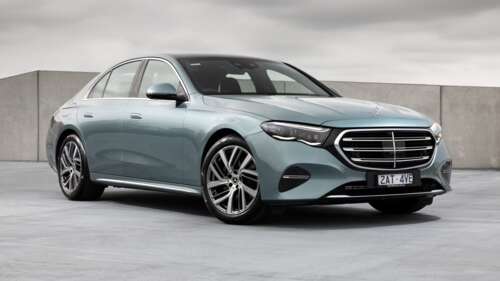 A high-detail, cinematic shot of the 2025 Mercedes-Benz E-Class luxury sedan. wallpaper