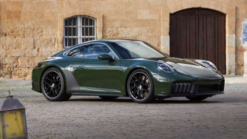Close-up of a sleek, modern 2025 Porsche 911 Carrera GTS in high detail. free wallpaper