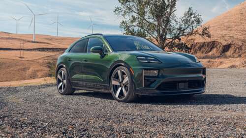 A detailed, high-quality view of the 2025 Porsche Macan Turbo, featuring its sleek... free wallpaper
