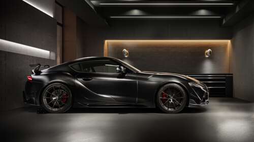 A cinematic studio shot of the 2025 Toyota GR Supra A90 Final Edition with a dark,... free wallpaper