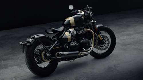 A high-resolution 5K close-up of the 2025 Triumph Bonneville Bobber TFC cruiser motorcycle... wallpaper
