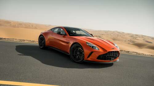 A high-detail, ultra-HD shot of a sleek Aston Martin Vantage luxury sports car. wallpaper